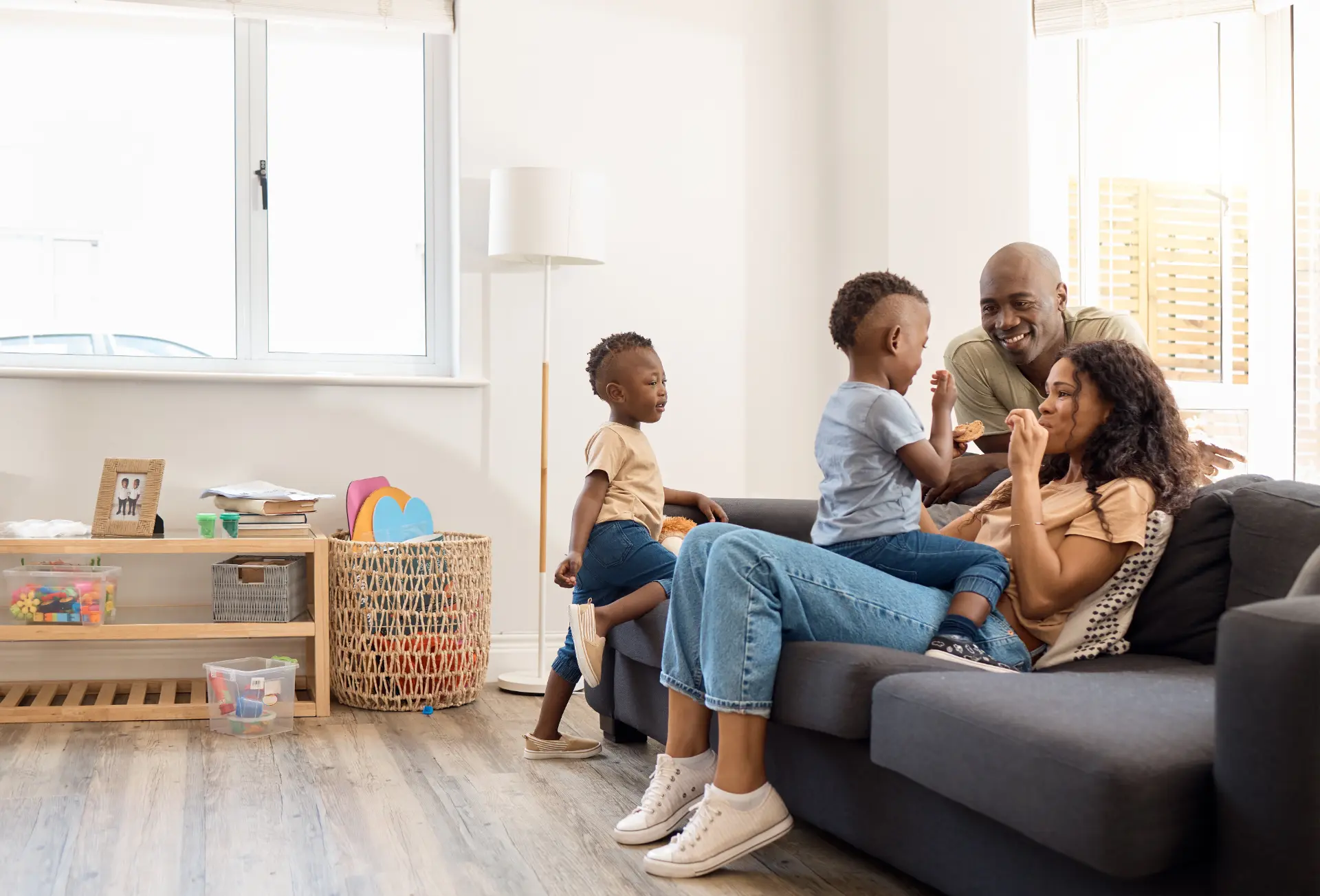 Family relaxing together on a sofa at home